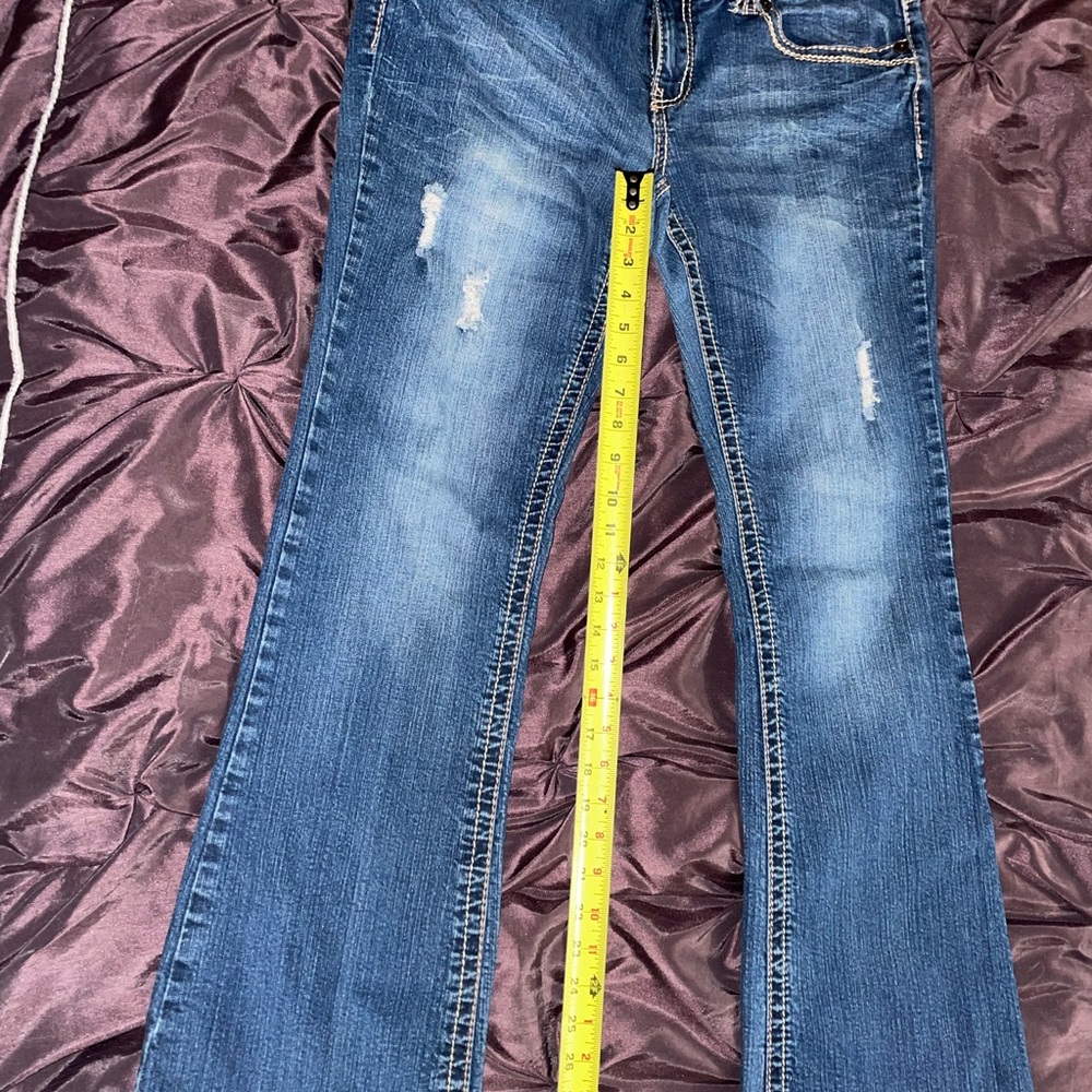 Ariya Blue Boot Cut Jeans with Distressing and Contrast Stitching